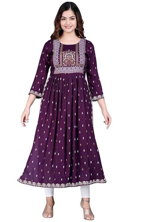 Woman wearing a maroon party wear ethnic kurta style by Nishtha Chadda
