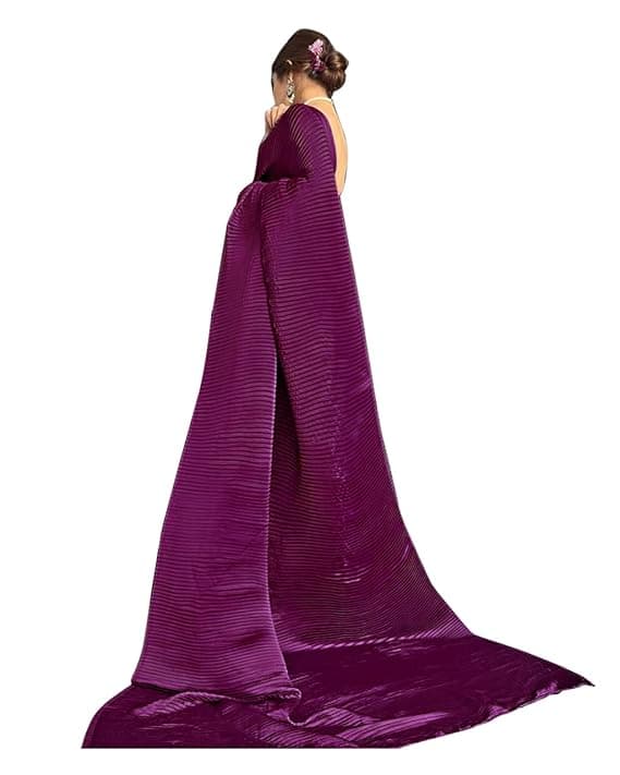 Woman wearing a maroon party wear ethnic kurta style by Nishtha Chadda