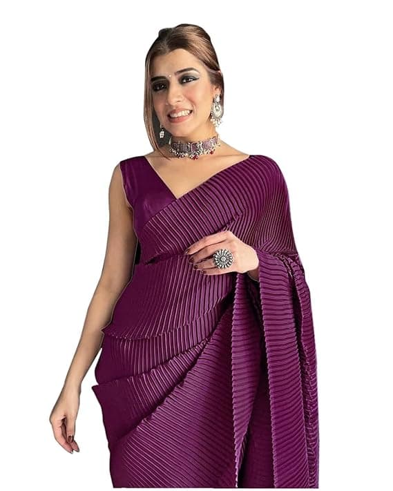 Woman wearing a maroon party wear ethnic kurta style by Nishtha Chadda