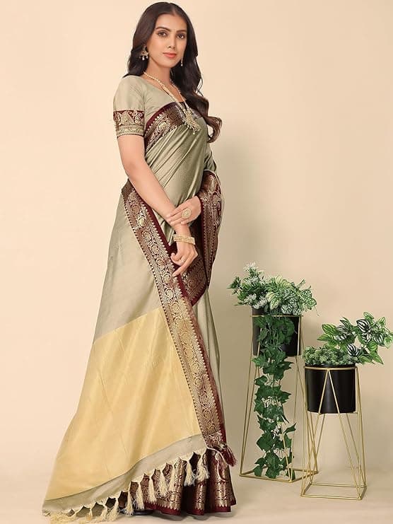Woman wearing a grey party wear ethnic kurta style by Nishtha Chadda