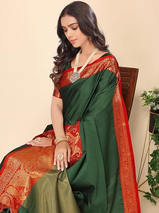 Woman wearing a red party wear ethnic kurta style by Nishtha Chadda