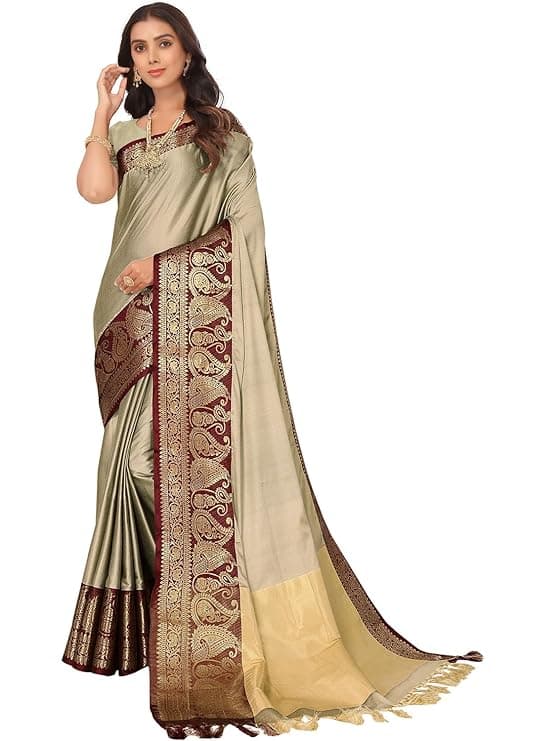 Woman wearing a brown party wear ethnic kurta style by Nishtha Chadda