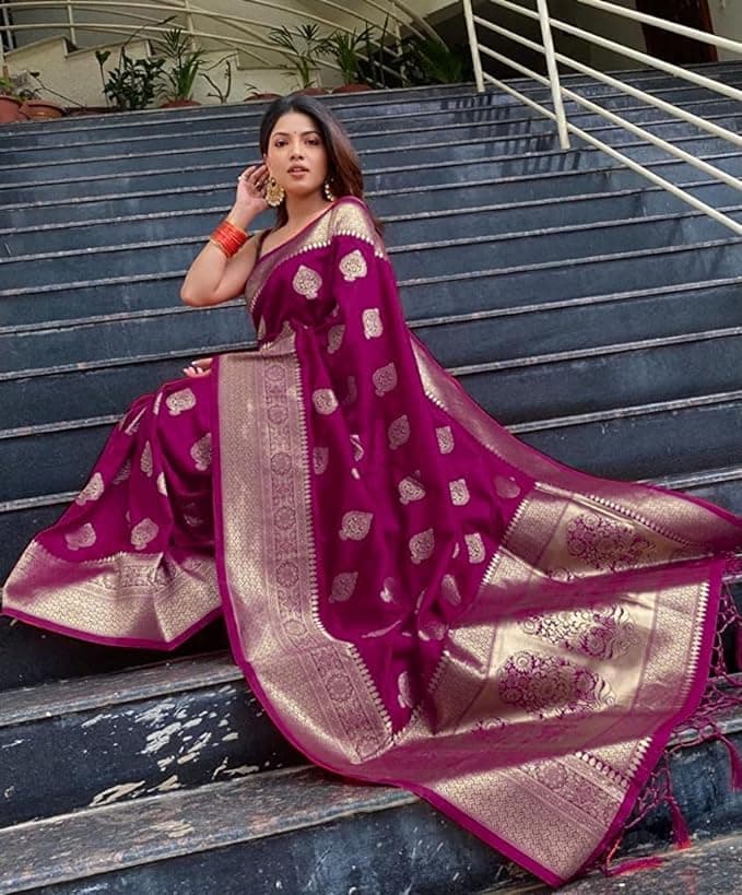 Woman wearing a maroon party wear ethnic kurta style by Nishtha Chadda
