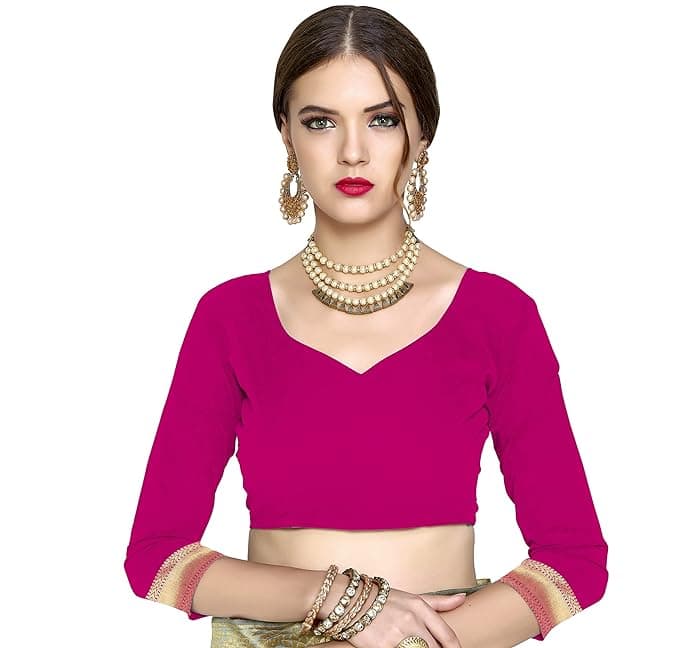 Woman wearing a red party wear ethnic kurta style by Nishtha Chadda