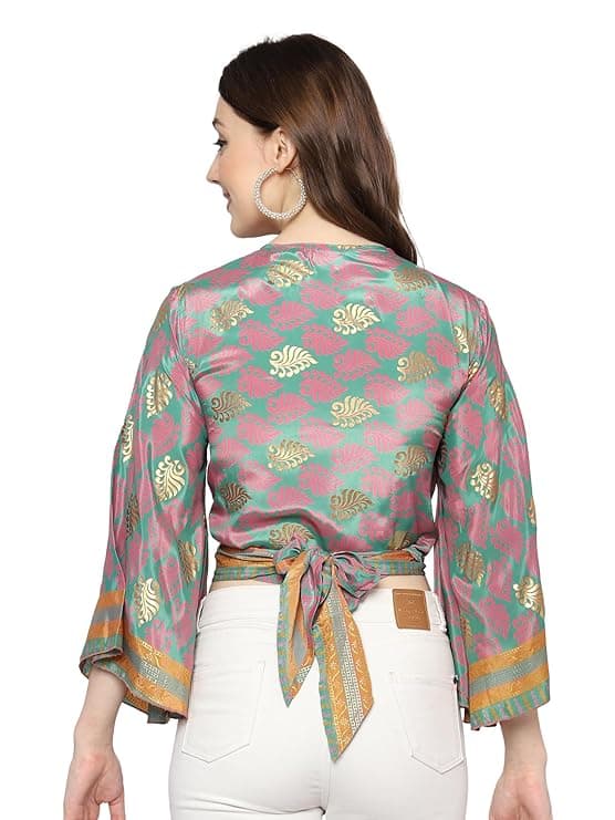 Woman wearing a grey party wear ethnic kurta style by Nishtha Chadda