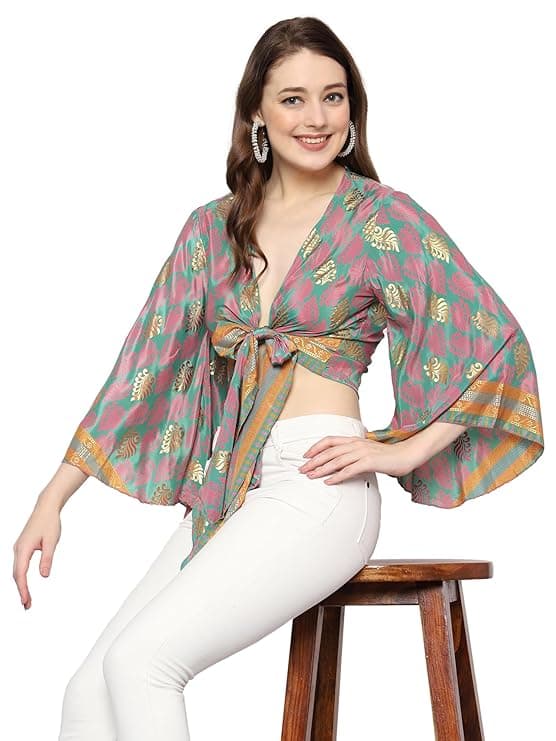 Woman wearing a brown party wear ethnic kurta style by Nishtha Chadda