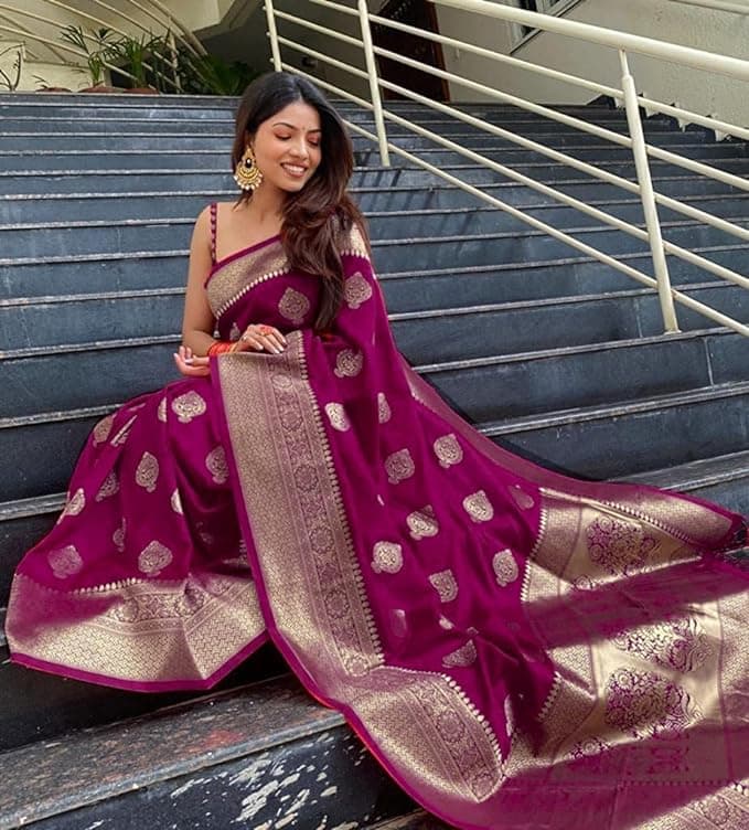 Woman wearing a maroon party wear ethnic kurta style by Nishtha Chadda
