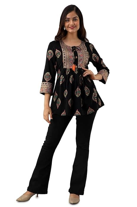 Woman wearing a brown party wear ethnic kurta style by Nishtha Chadda