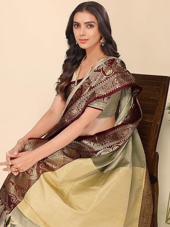 Woman wearing a maroon party wear ethnic kurta style by Nishtha Chadda