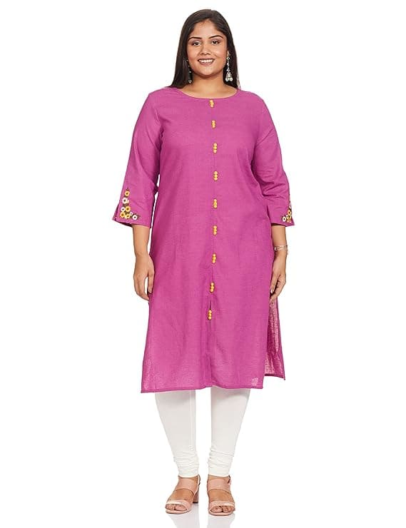 Woman wearing a pink party wear ethnic kurta style by Nishtha Chadda