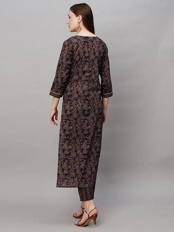 Woman wearing a brown party wear ethnic kurta style by Nishtha Chadda