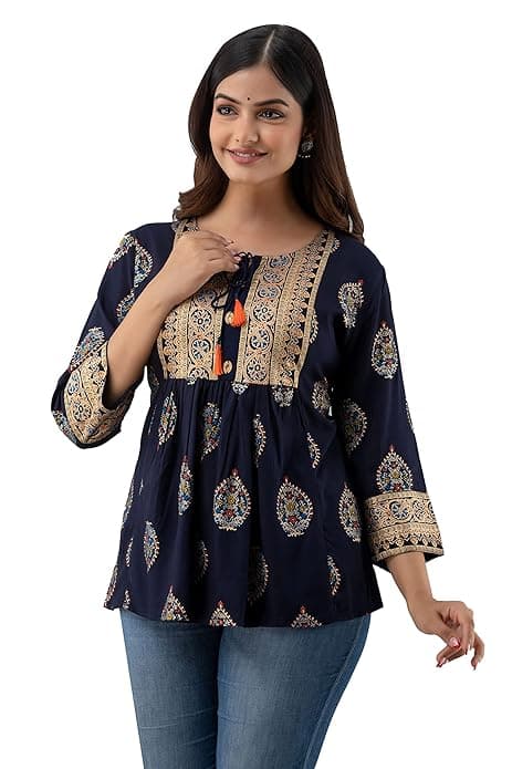 Woman wearing a brown party wear ethnic kurta style by Nishtha Chadda