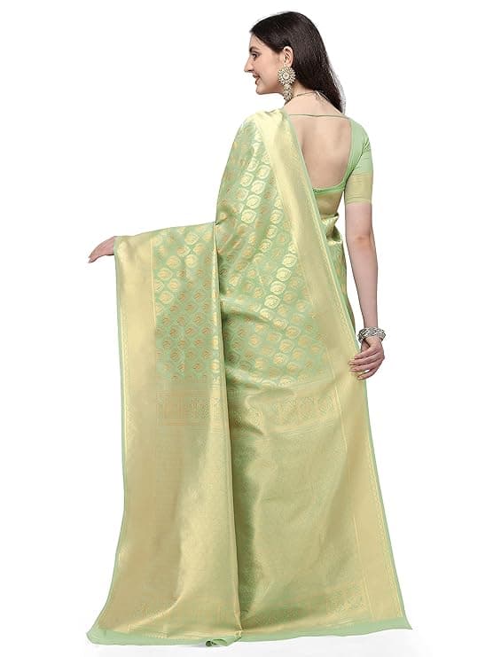 Woman wearing a beige party wear ethnic kurta style by Nishtha Chadda