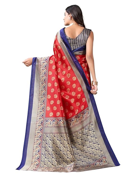Woman wearing a red party wear ethnic kurta style by Nishtha Chadda