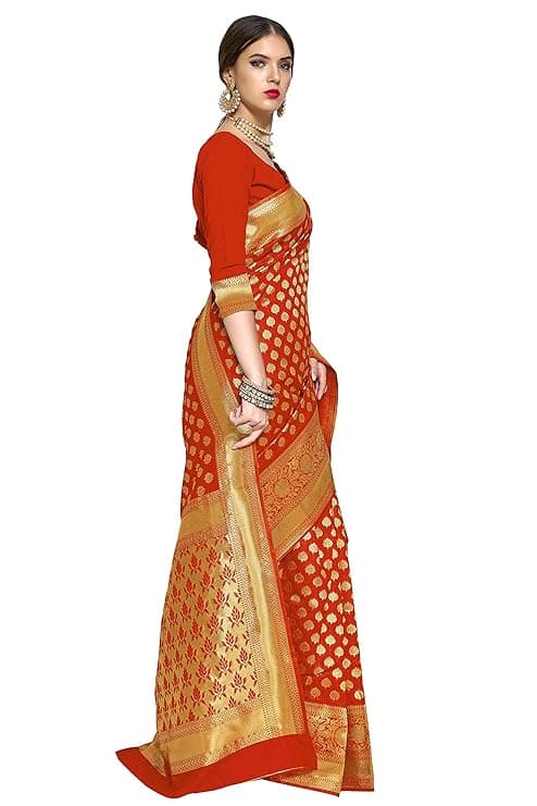 Woman wearing a red party wear ethnic kurta style by Nishtha Chadda