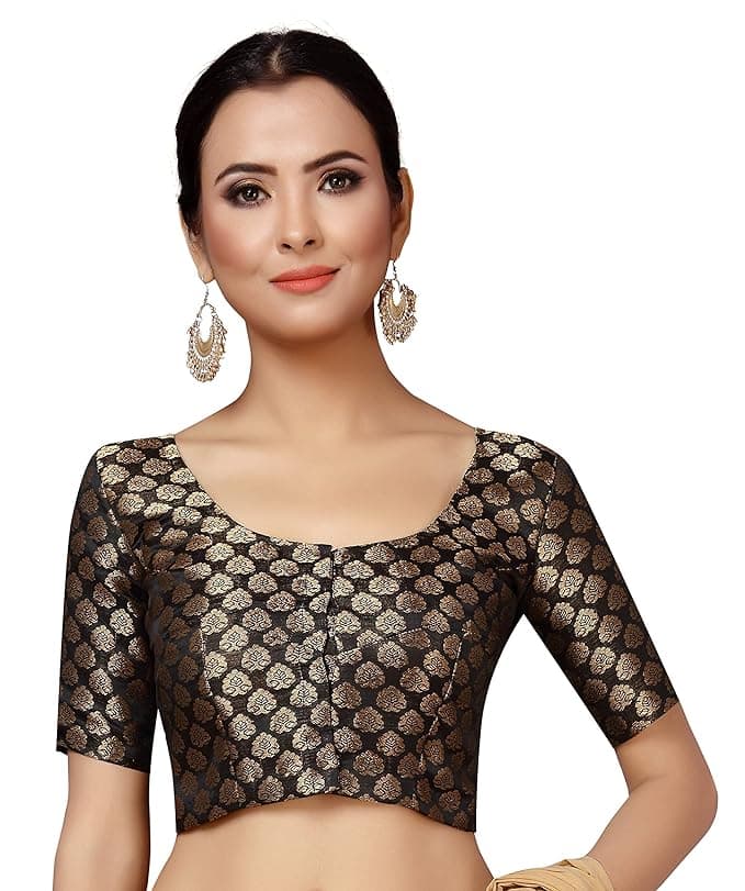 Woman wearing a brown party wear ethnic kurta style by Nishtha Chadda