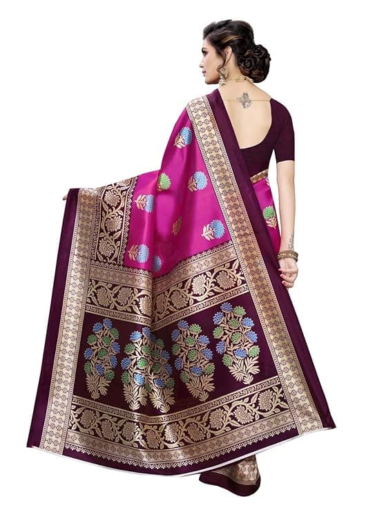 Woman wearing a maroon party wear ethnic kurta style by Nishtha Chadda