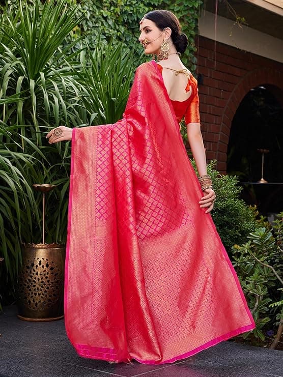 Woman wearing a red party wear ethnic kurta style by Nishtha Chadda