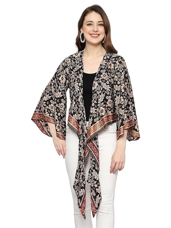 Woman wearing a grey party wear ethnic kurta style by Nishtha Chadda