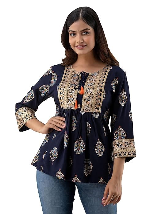 Woman wearing a brown party wear ethnic kurta style by Nishtha Chadda