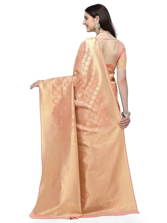 Woman wearing a beige party wear ethnic kurta style by Nishtha Chadda