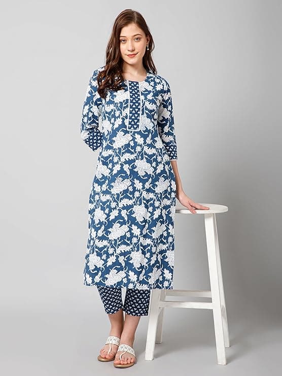 Woman wearing a grey party wear ethnic kurta style by Nishtha Chadda