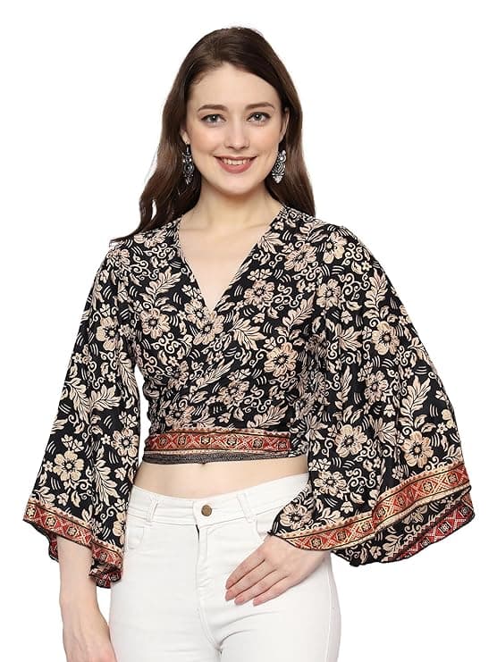 Woman wearing a grey party wear ethnic kurta style by Nishtha Chadda