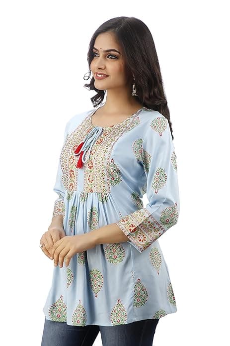Woman wearing a grey party wear ethnic kurta style by Nishtha Chadda