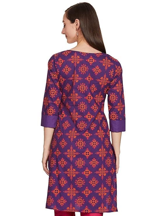 Woman wearing a brown party wear ethnic kurta style by Nishtha Chadda