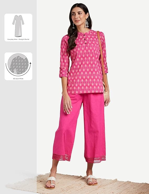 Woman wearing a pink party wear ethnic kurta style by Nishtha Chadda