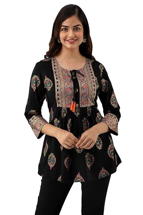 Woman wearing a brown party wear ethnic kurta style by Nishtha Chadda