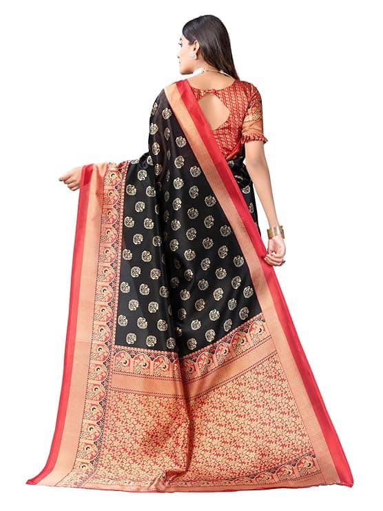 Woman wearing a coral party wear ethnic kurta style by Nishtha Chadda