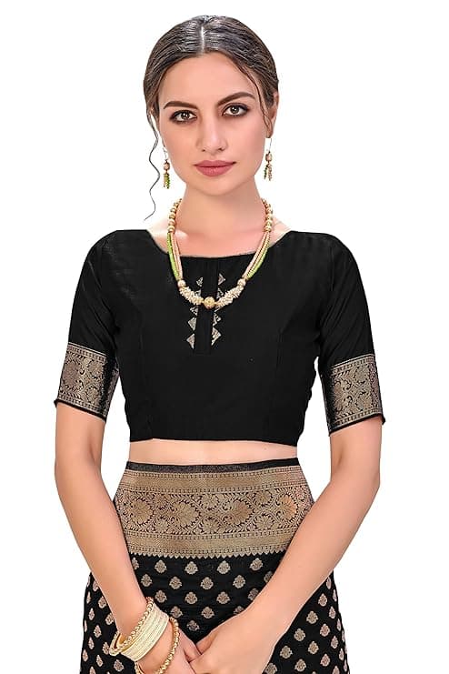Woman wearing a beige party wear ethnic kurta style by Nishtha Chadda