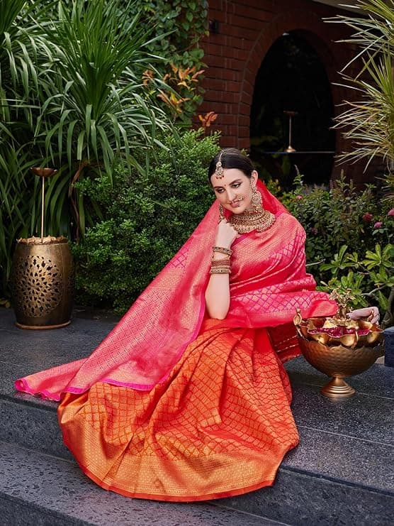 Woman wearing a red party wear ethnic kurta style by Nishtha Chadda