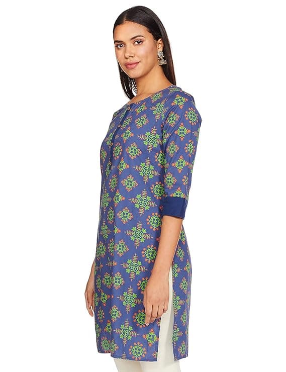 Woman wearing a grey party wear ethnic kurta style by Nishtha Chadda