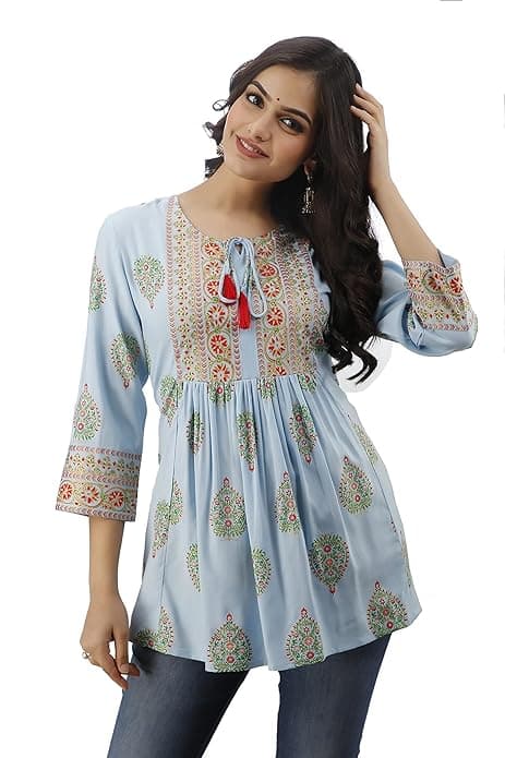 Woman wearing a grey party wear ethnic kurta style by Nishtha Chadda