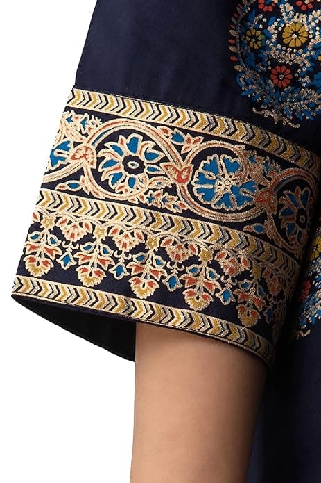Woman wearing a brown party wear ethnic kurta style by Nishtha Chadda