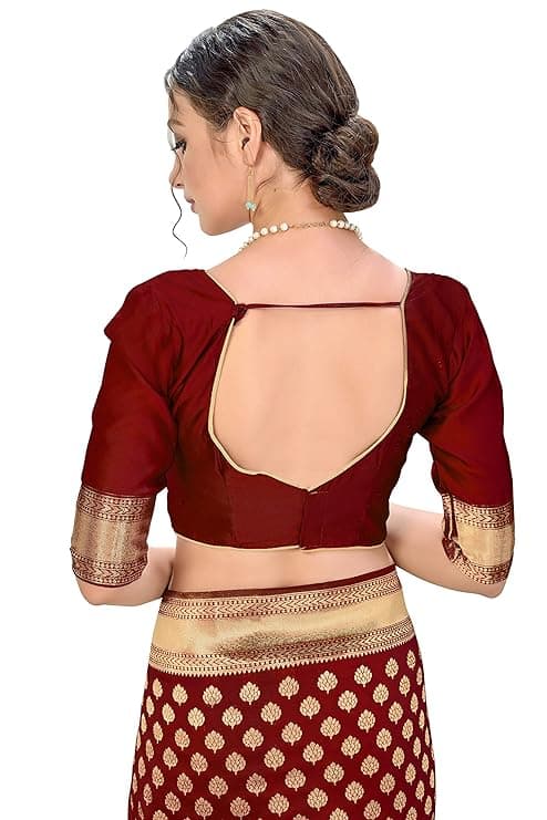 Woman wearing a maroon party wear ethnic kurta style by Nishtha Chadda