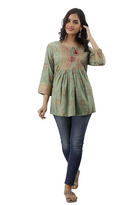 Woman wearing a grey party wear ethnic kurta style by Nishtha Chadda