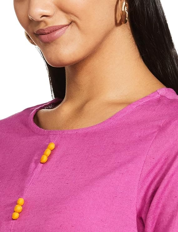 Woman wearing a pink party wear ethnic kurta style by Nishtha Chadda