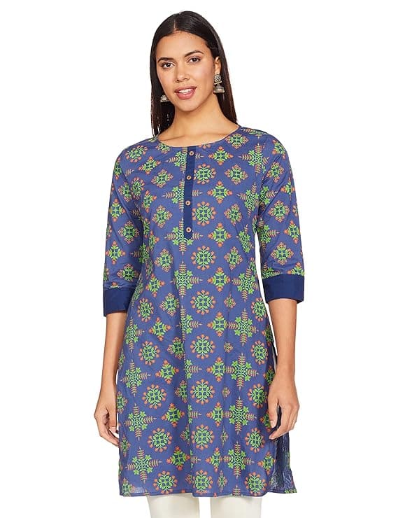 Woman wearing a grey party wear ethnic kurta style by Nishtha Chadda