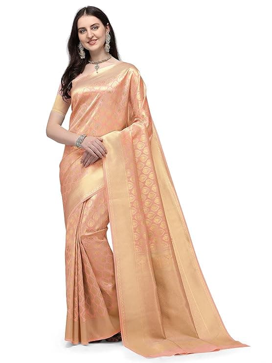 Woman wearing a coral party wear ethnic kurta style by Nishtha Chadda