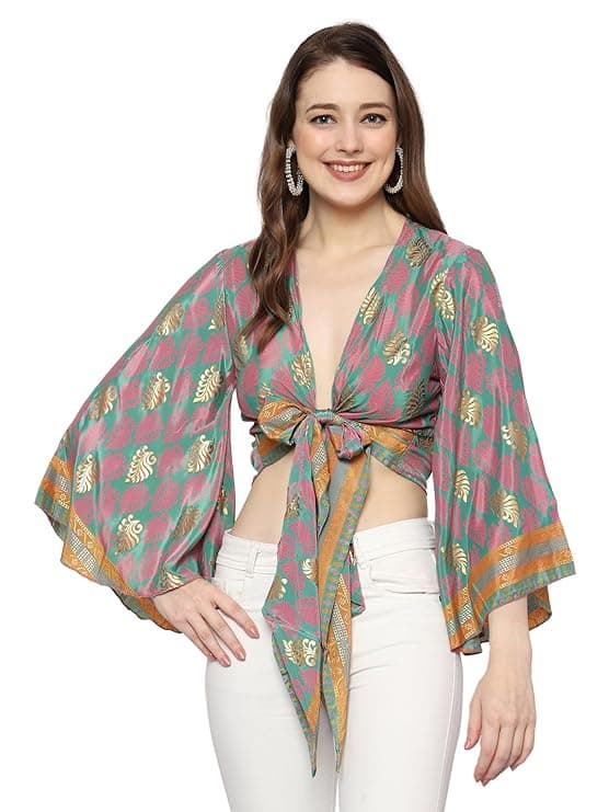 Woman wearing a grey party wear ethnic kurta style by Nishtha Chadda