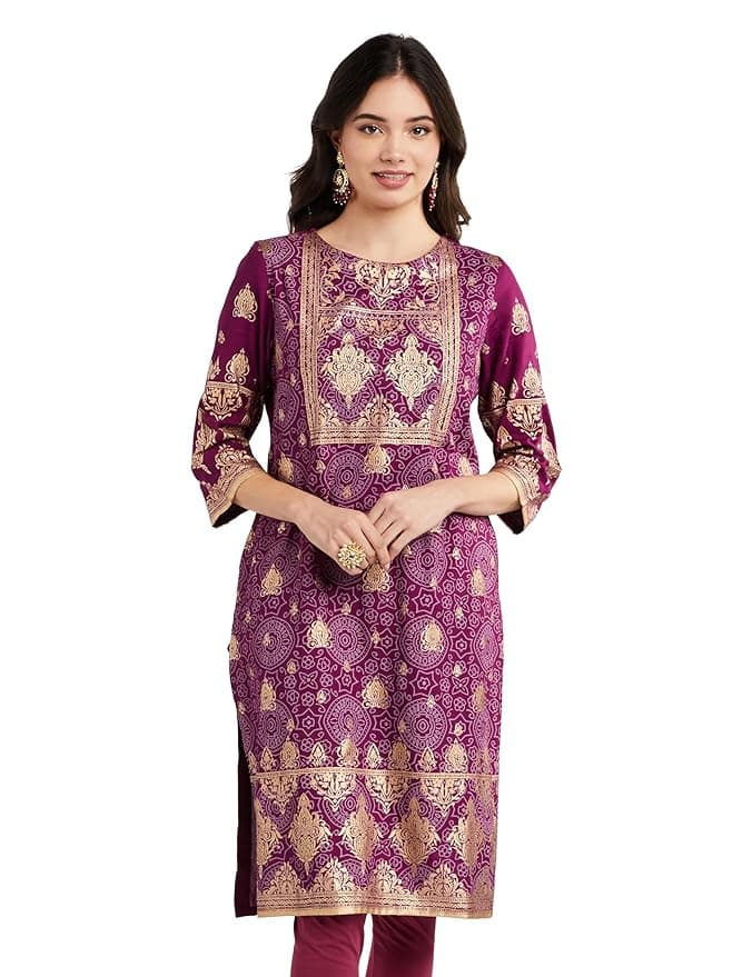 Woman wearing a brown party wear ethnic kurta style by Nishtha Chadda