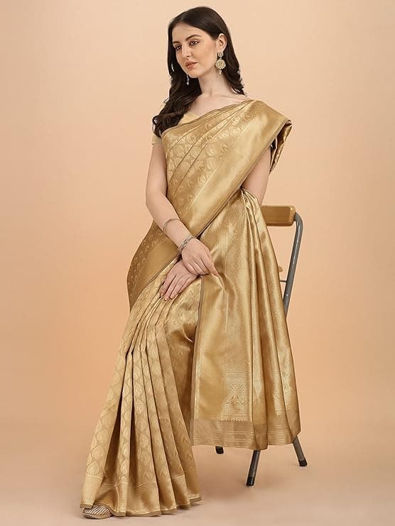 Woman wearing a brown party wear ethnic kurta style by Nishtha Chadda