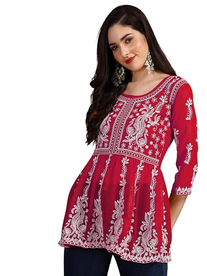 Woman wearing a red party wear ethnic kurta style by Nishtha Chadda