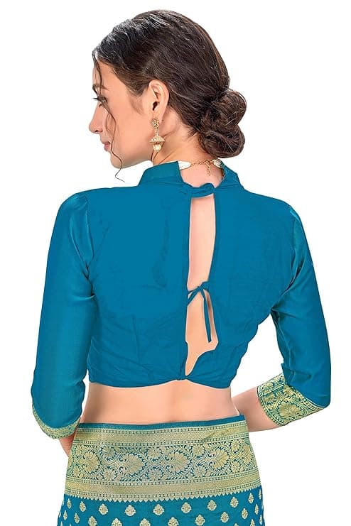 Woman wearing a teal party wear ethnic kurta style by Nishtha Chadda