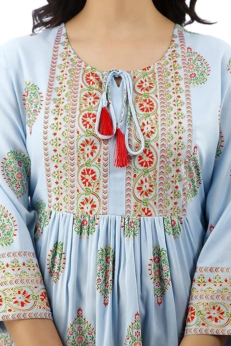 Woman wearing a grey party wear ethnic kurta style by Nishtha Chadda