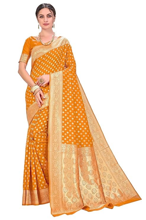 Woman wearing a orange party wear ethnic kurta style by Nishtha Chadda