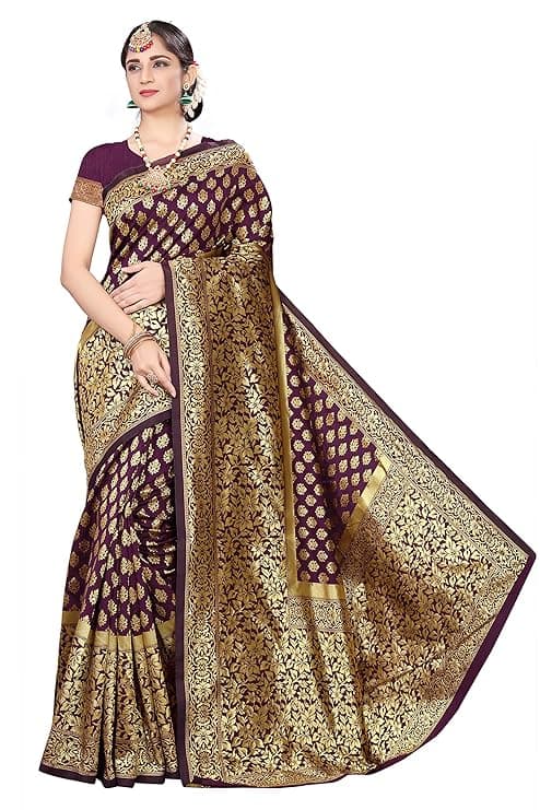 Woman wearing a brown party wear ethnic kurta style by Nishtha Chadda
